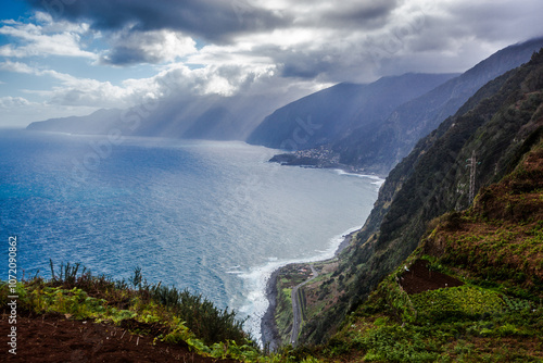 Coast line of Madeira island on sloudy day , Portugal photo