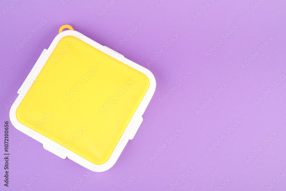 Sandwich lunch box on lilac background, top view. Space for text Sandwich lunch box on lilac background, top view. Space for text