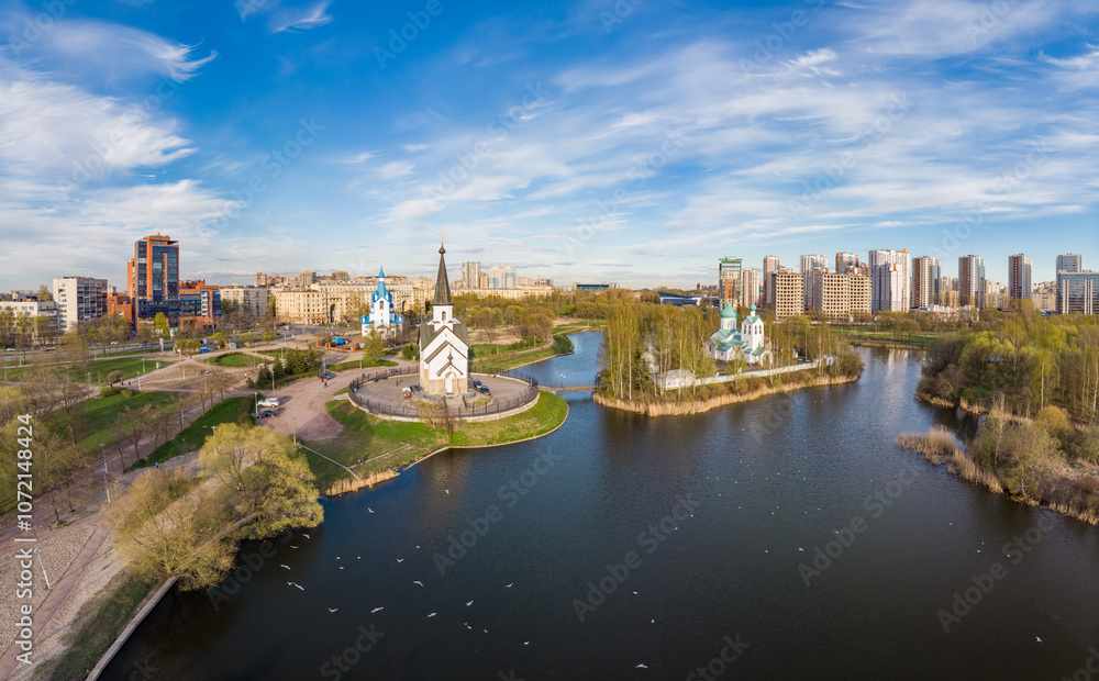 Obraz premium Aerial top View to St. George the Victorious Georgievskaya, Sergius Of Radonezh and Church Nativity of Christ and Srednerogatsky pond. Pulkovsky park. Saint Petersburg. Russia. Europe