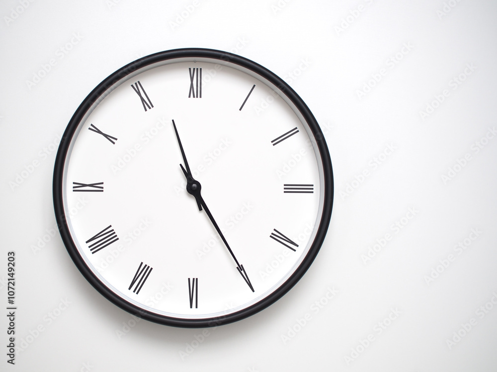 Clock Showing 23.25/11.25 with Roman Numerals – Simple Round Clock for Concepts of Time Management and Scheduling. Clock Showing 23.25/11.25 with Roman Numerals – Simple Round Clock for Concepts of Time Management and Scheduling.