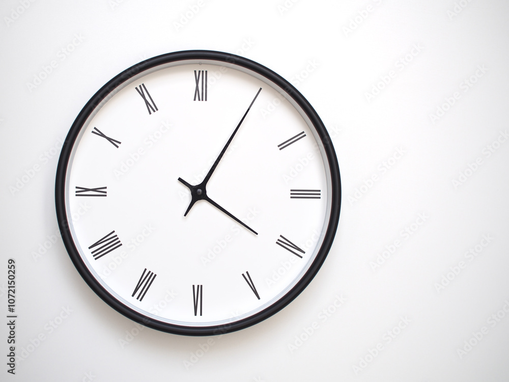 Clock Showing 16.05/04.05 with Roman Numerals – Simple Round Clock for Concepts of Time Management and Scheduling. Clock Showing 16.05/04.05 with Roman Numerals – Simple Round Clock for Concepts of Time Management and Scheduling.