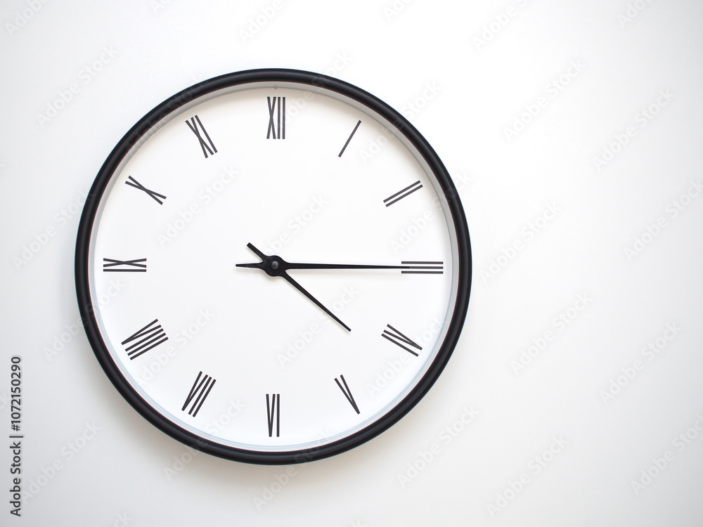 Clock Showing 16.15/04.15 with Roman Numerals – Simple Round Clock for Concepts of Time Management and Scheduling. Clock Showing 16.15/04.15 with Roman Numerals – Simple Round Clock for Concepts of Time Management and Scheduling.
