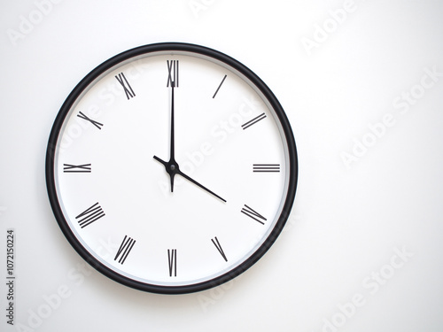 Clock Showing 16.00/04.00 with Roman Numerals – Simple Round Clock for Concepts of Time Management and Scheduling.