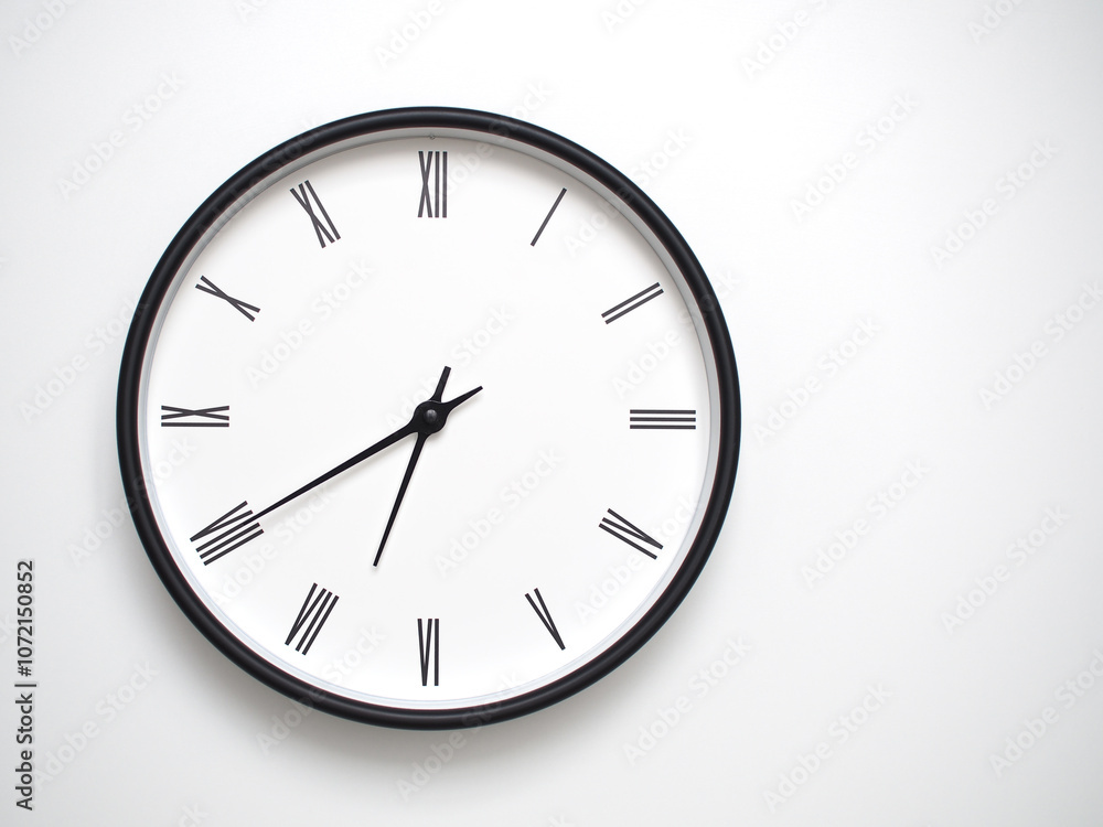 Clock Showing 18.40/06.40 with Roman Numerals – Simple Round Clock for Concepts of Time Management and Scheduling. Clock Showing 18.40/06.40 with Roman Numerals – Simple Round Clock for Concepts of Time Management and Scheduling.