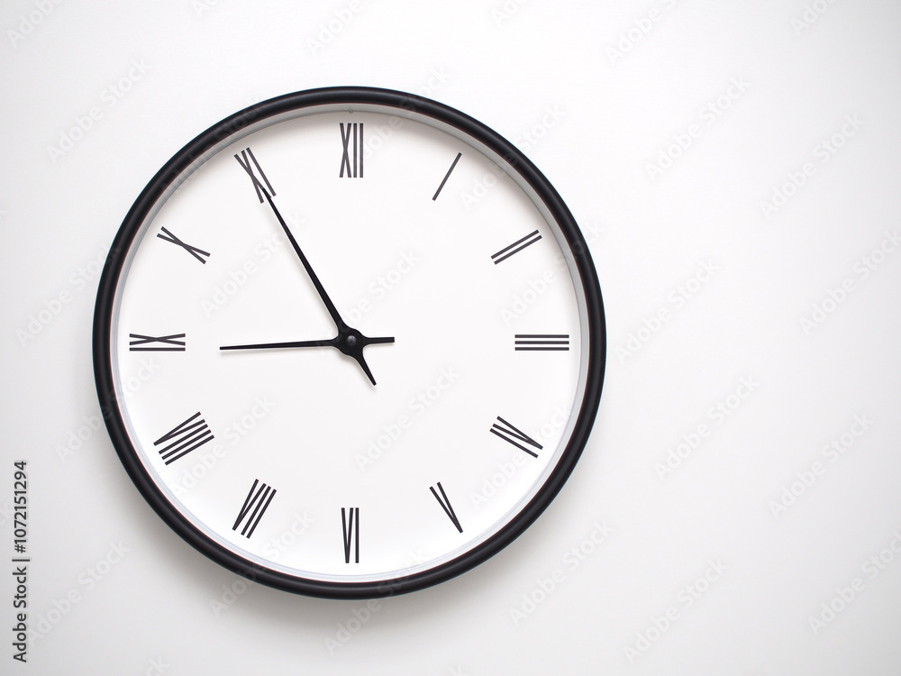 Clock Showing 20.55 or 08.55 with Roman Numerals – Simple Round Clock for Concepts of Time Management and Scheduling. Clock Showing 20.55 or 08.55 with Roman Numerals – Simple Round Clock for Concepts of Time Management and Scheduling.