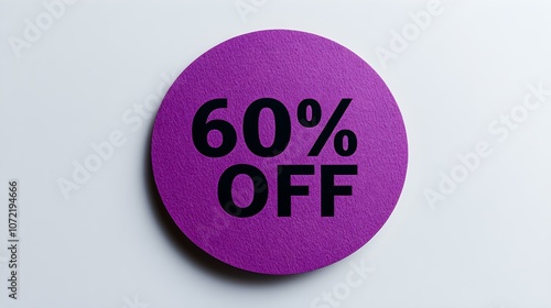 Black '60% OFF' Text on a Dark Purple Round Paper Note. White Background with Copy Space