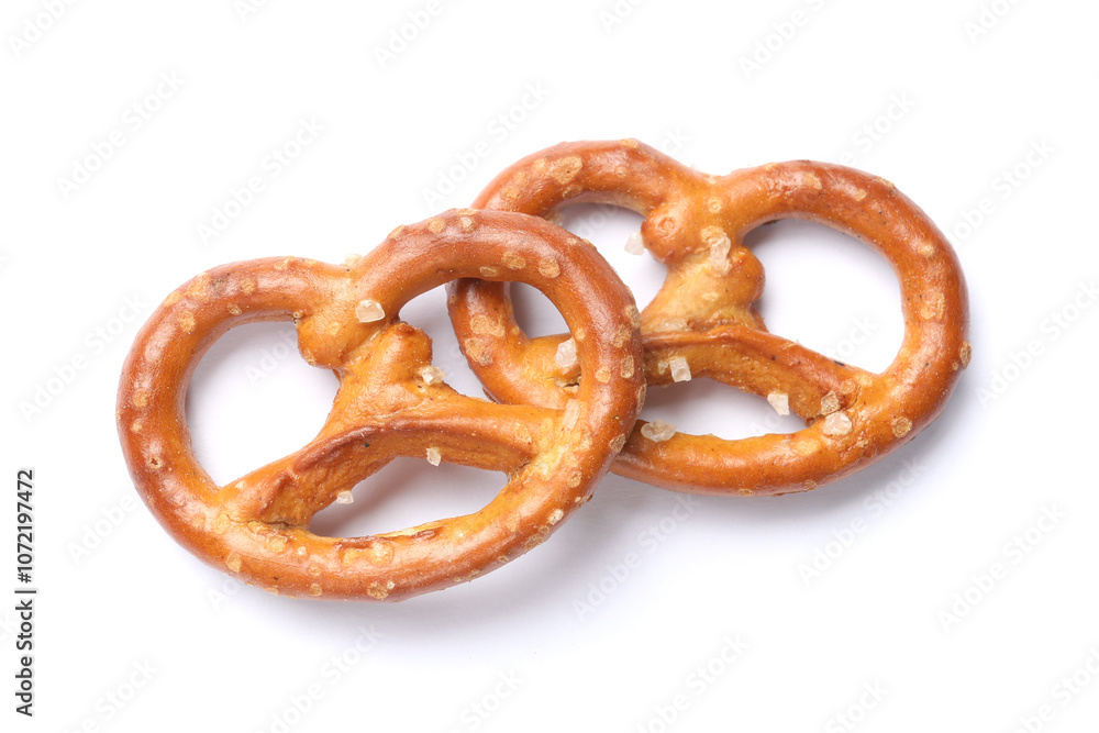 Two delicious pretzel crackers isolated on white, top view Two delicious pretzel crackers isolated on white, top view