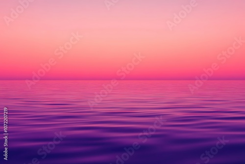 A serene ocean view at sunset with vibrant purple and pink hues reflecting on the water.