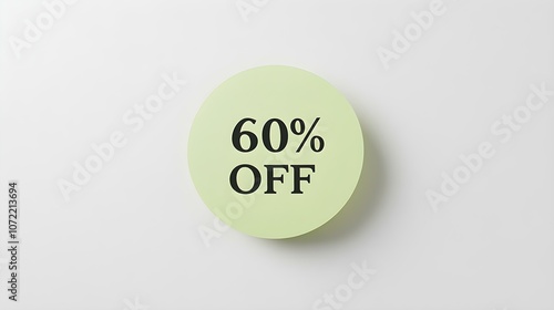 Black '60% OFF' Text on a Light Green Round Paper Note. White Background with Copy Space