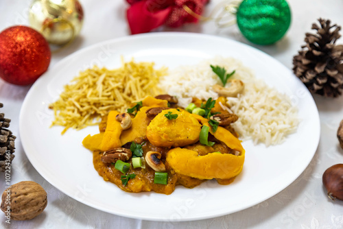 Traditional and exotic Brazilian dish rice, chicken and pequi (caryocar brasileinse) 