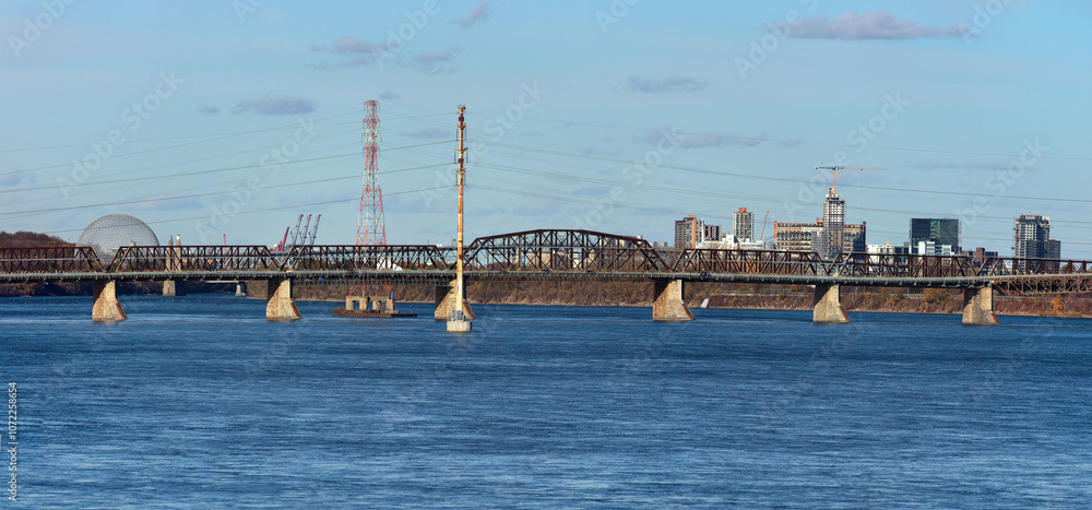 Victoria Bridge with Montreal Biosphere and Longueuil in Background Victoria Bridge with Montreal Biosphere and Longueuil in Background