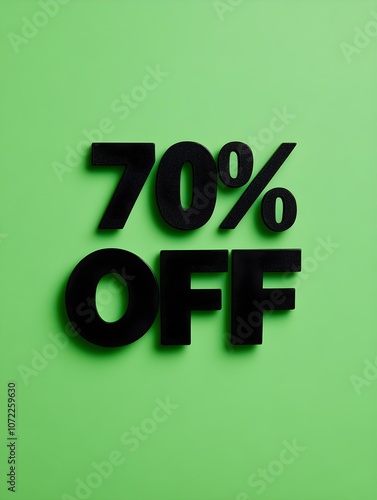 Black '70% OFF' Promotional Sign on a Green Background