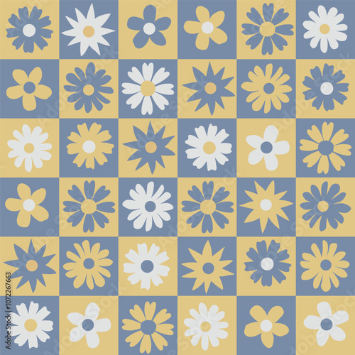 Seamless contemporary patchwork designed pattern with various yellow, blue and white flowers on squared background