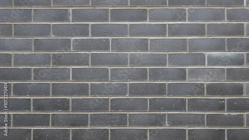 gray brick wall with white cement joints as graphic resource and background texture, with empty copy space, plain wall made of smooth bricks