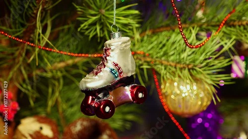 Roller Skates. Christmas tree toy decorations. New Year and Merry Christmas. Smooth camera movement on the slider. Video postcard. Live christmas tree with garlands and toys