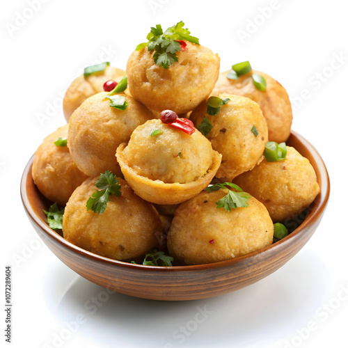 Spicy golgappas (pani puri) with a pleated edge, filled