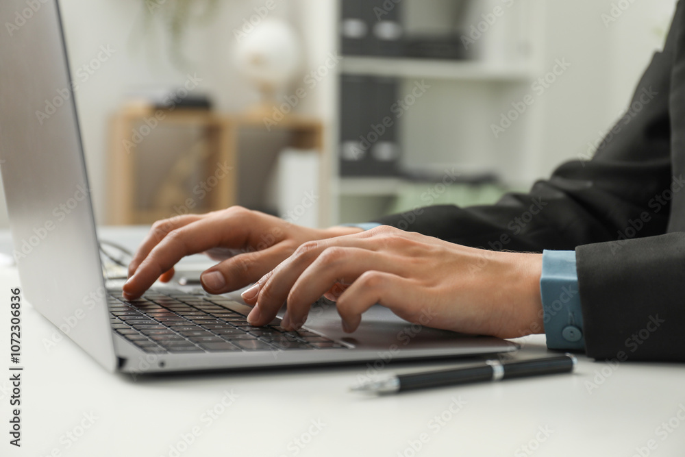 Businesswoman using laptop at white table indoors, closeup. Modern technology Businesswoman using laptop at white table indoors, closeup. Modern technology