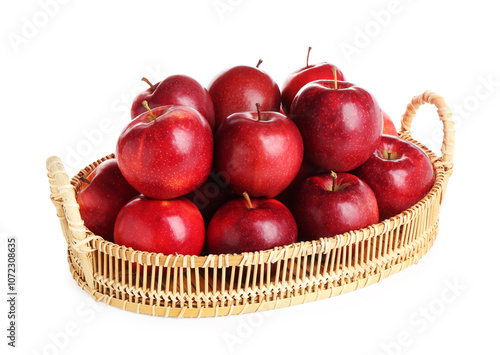 Fresh ripe red apples in wicker tray isolated on white