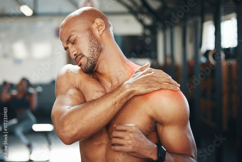 Valokuva Fitness, gym and man with shoulder pain, hurt and tension of muscle, accident and arm with inflammation