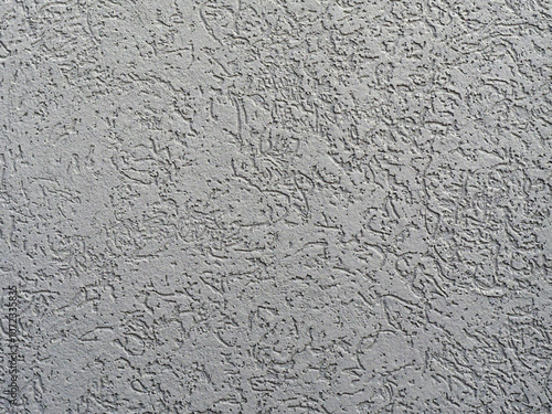 Wall with a gray paint that has a rough texture