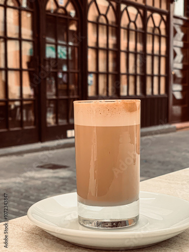 Glass of Coffee with Milk in a Historic Canary Island Town