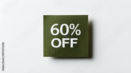 White '60% OFF' Text on a Dark Green Square Paper Note. White Background with Copy Space