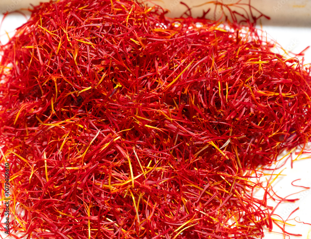 Fototapeta premium Close-up of vibrant red saffron threads after processing.