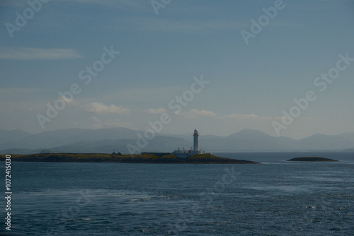 lighthouse on the scottish seafront, isle of mull iona