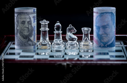 100 dollars and 100 Turkish lira , Economic war on the chessboard. Fictional shooting and custom focus adjustable. photo