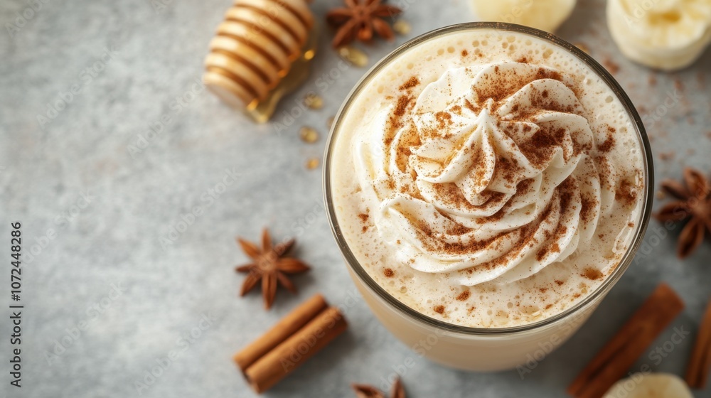 Indulge in a creamy spiced beverage with whipped topping and honey drizzles, perfect for cozy gatherings in fall Indulge in a creamy spiced beverage with whipped topping and honey drizzles, perfect for cozy gatherings in fall