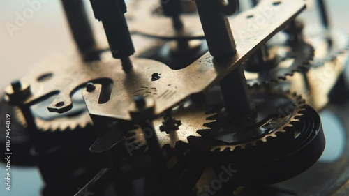 Close up of Clockwork alarm gears with ticking sound, ticking bomb mechanism