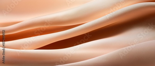 A close up of a beige fabric with wavy lines