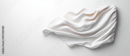 A white sculpture of a wave on a white wall