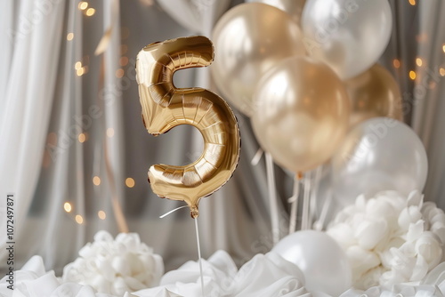 Golden helium floating balloons made in shape of number five. Birthday jubilee party or wedding anniversary for 5 years celebration. Elegant white decorations	
