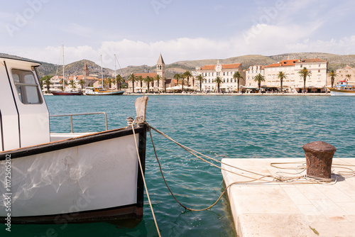 View of Hvar town harbour with the boat in the foreground on Hvar island, Croatia