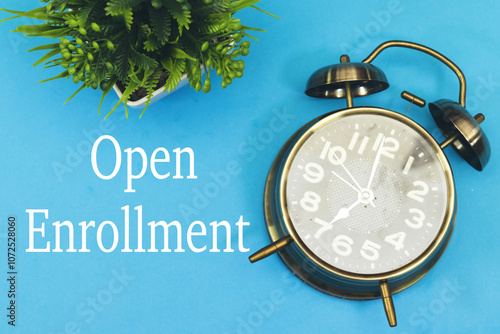 open enrollment concept with alarm clock, time to registration