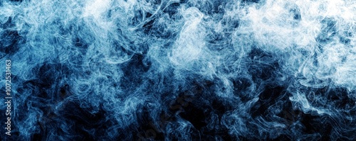 Ethereal Blue Smoke on a Dark Background with Soft Swirls and Wisps Creating a Mysterious and Dreamy Atmosphere for Background or Artistic Use