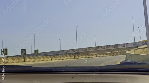A view of a road with a sign on it