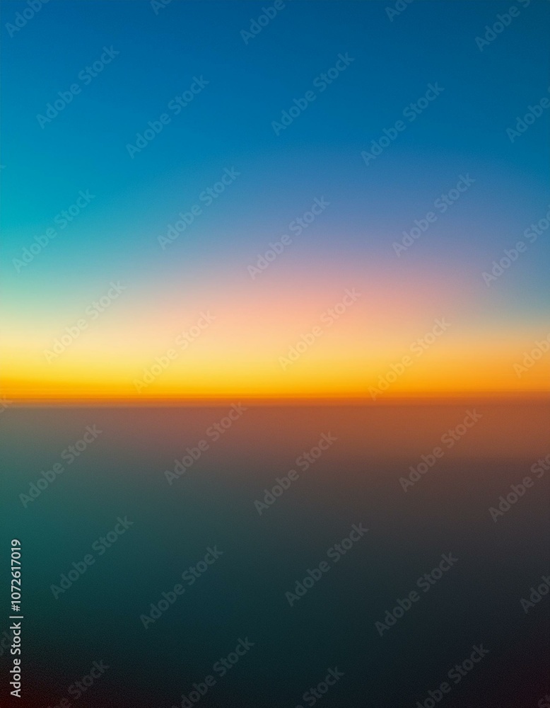 A vibrant sunset paints the sky with hues of orange, pink, and blue, casting a warm glow over a vast expanse of clouds. A vibrant sunset paints the sky with hues of orange, pink, and blue, casting a warm glow over a vast expanse of clouds.