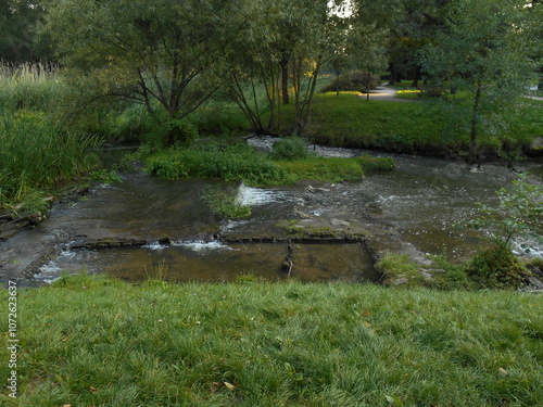 Oława River in the Eastern Park in Wrocław, Poland. Water levels, channels, culverts.