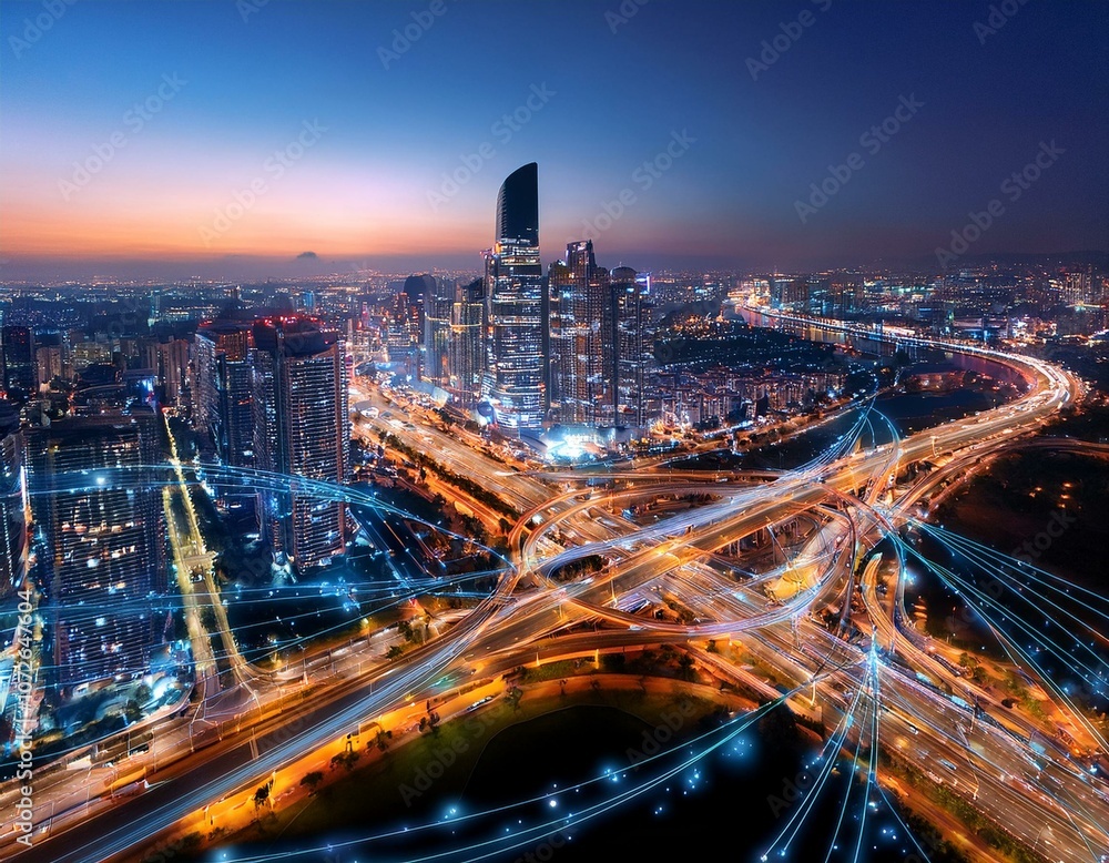 A drone overview of a smart city at night – illuminated buildings and networked traffic systems flow through the streets like a digital stream A drone overview of a smart city at night – illuminated buildings and networked traffic systems flow through the streets like a digital stream