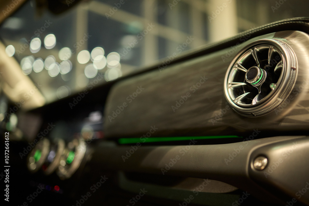 Obraz premium Closeup of car dashboard air vents near gear shift