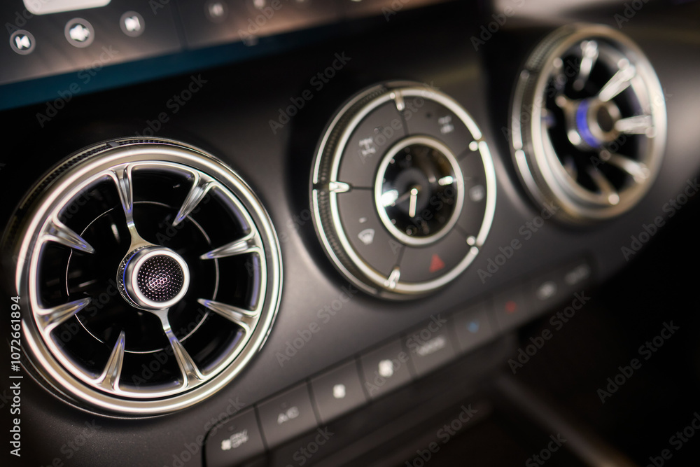 Fototapeta premium Closeup of car dashboard air vents near gear shift