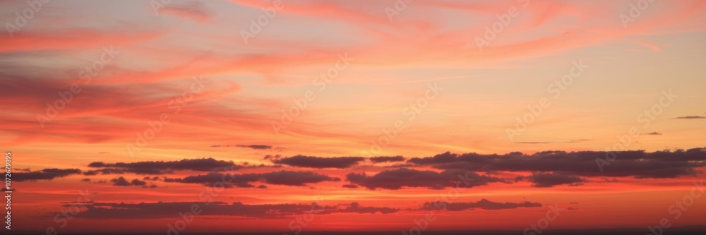 Vibrant red and orange sunset over a wide sky with a multitude of shades of colors, sunrise, peaceful Vibrant red and orange sunset over a wide sky with a multitude of shades of colors, sunrise, peaceful
