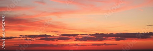Vibrant red and orange sunset over a wide sky with a multitude of shades of colors, sunrise, peaceful