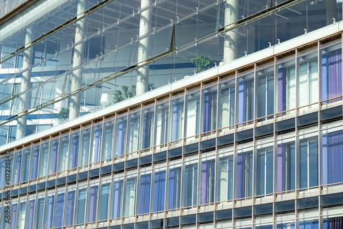 Glass wall of office building. Modern glass wall facade buildings. Glass wall architecture details. Modern building Exterior. Industry building background.