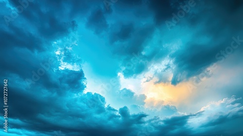 Dramatic Blue Sky with Fluffy Clouds and Sun Rays Breaking Through