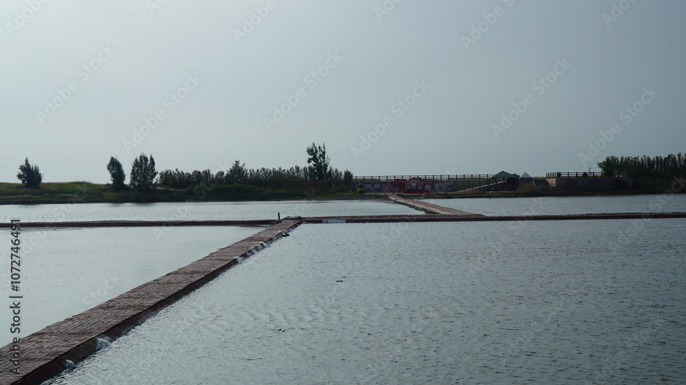 Fototapeta premium a salt farm that traps seawater to make salt