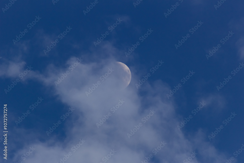 moon in the blue sky with white clouds in the morning, natural background moon in the blue sky with white clouds in the morning, natural background