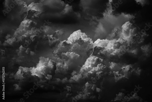 Obraz na płótnie Black white dark grey sky with clouds. Dramatic background. Thunderstorm storm hurricane rain wind thunder lightning. Night moonlight. Creepy ominous frightening danger nightmare horror. Epic mystic w salonie